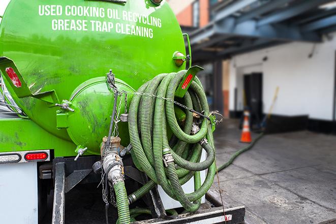 a large grease trap being pumped by a specialist in Granite Bay CA